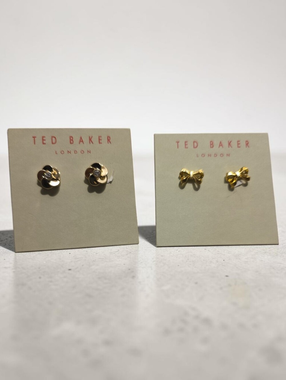 Ted Baker Gold Floral Or Bow Stud Earrings